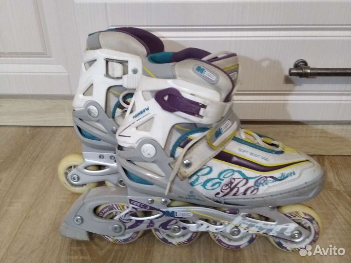 Роликовые коньки