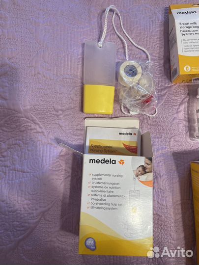 Молокоотсос medela swing flex