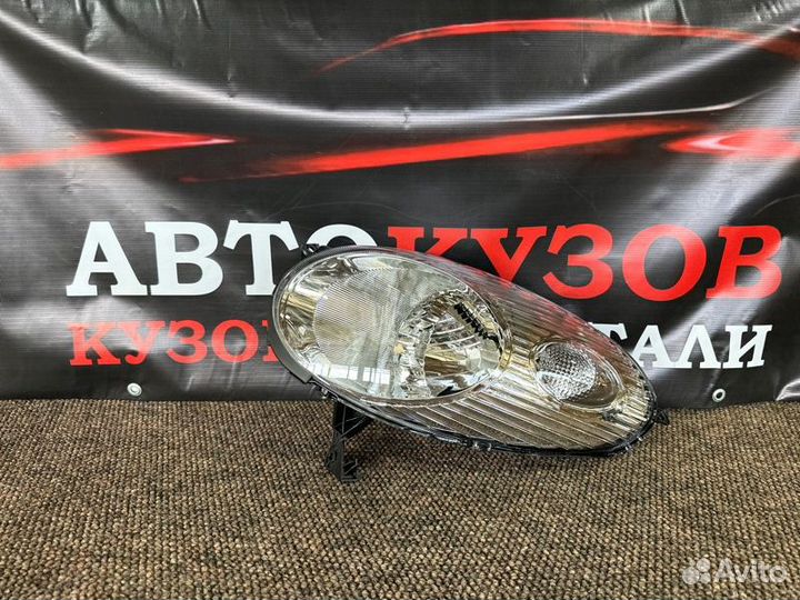 Фара левая Nissan Micra K-12 2002-2007