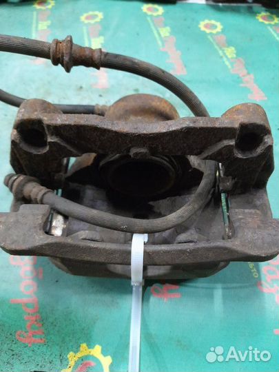 Суппорт передний левый Nissan Qashqai