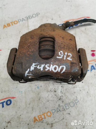 Суппорт тормозной передний левый Ford Fiesta MK5