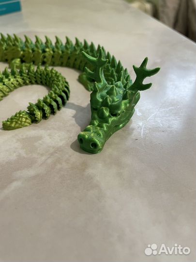 Игрушка подвижная дракон