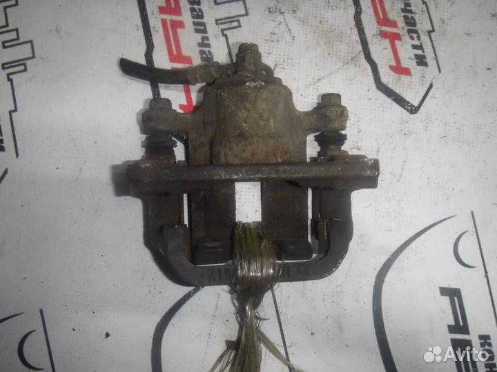 Суппорт В сборе nissan primera X-trail NT30 PNT30