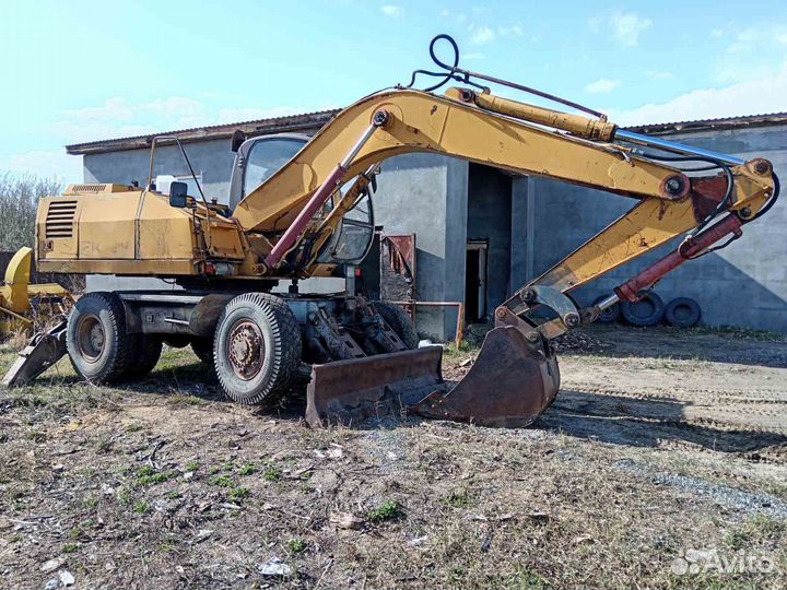 Колёсный экскаватор Твэкс ЕК-14, 2004