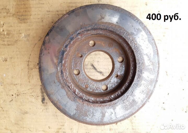 Диск тормозной передний Митцубиси Ланцер CB 92-00