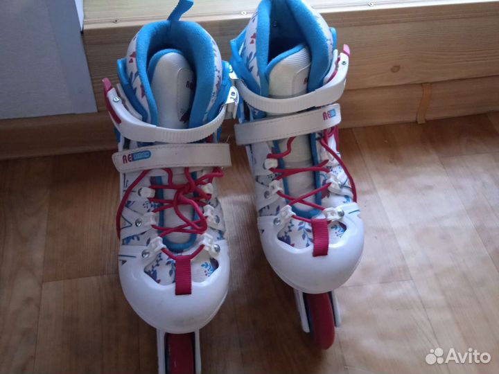 Роликовые коньки