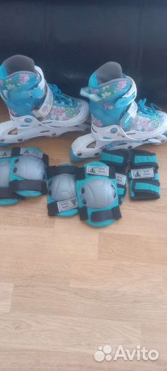 Роликовые коньки