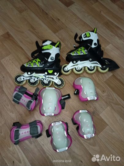 Роликовые коньки