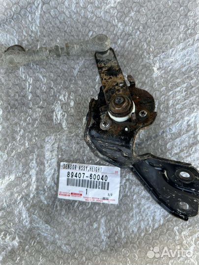 Датчик положения кузова prado 150