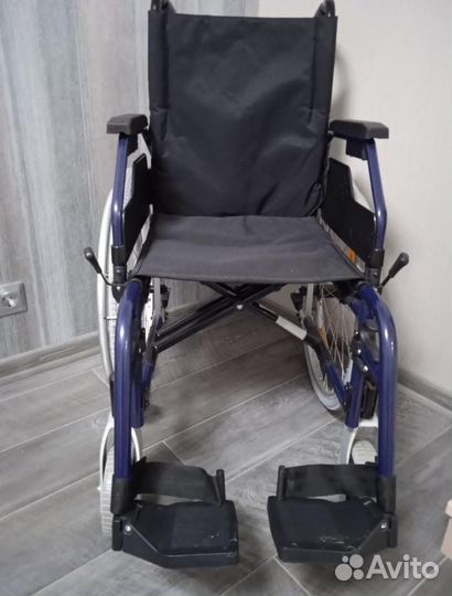 Инвалидное кресло
