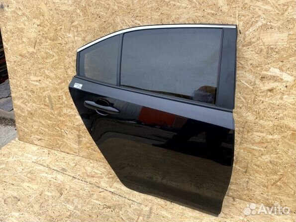 Стекло заднее правое Toyota Corolla E210