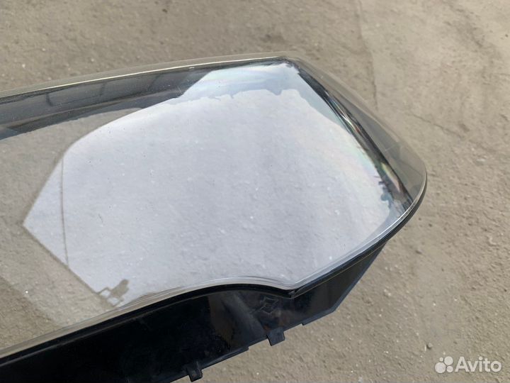 Стекло фары левой X3 E83