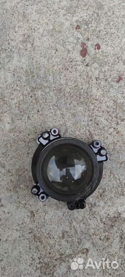 Линза в фару subaru