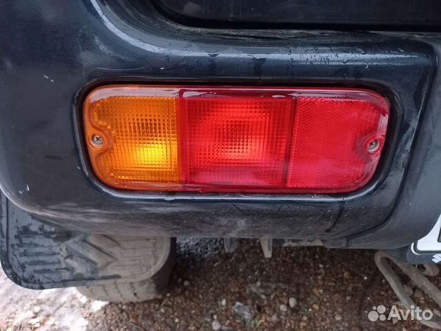 Поворотник бамперный левый Suzuki Jimny