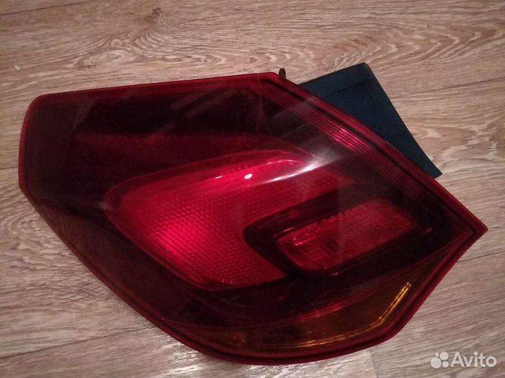 Задний левый фонарь Опель астра j хетчбек