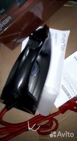 Новый электрический утюг