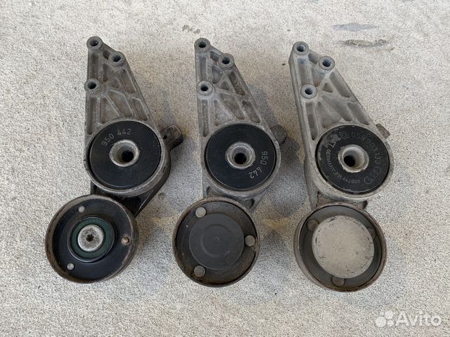 Натяжитель ремня VAG 058903133