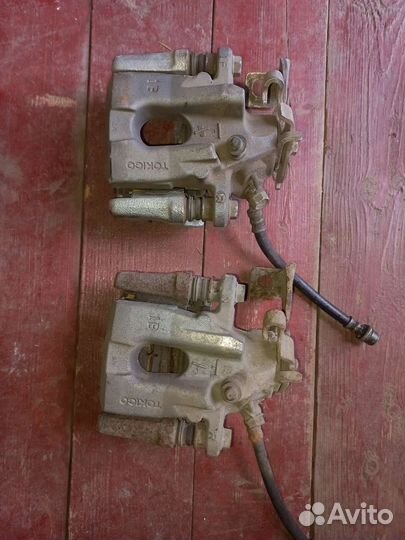 Суппорт задний на Тойота королла 150