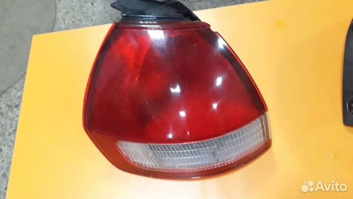 Стоп сигнал задний левый nissan wingroad Y11