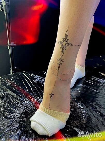 Мастер татуировки