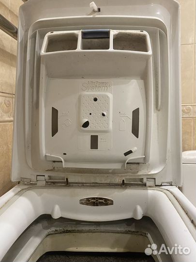 Стиральная машина с вертикальной загрузкой