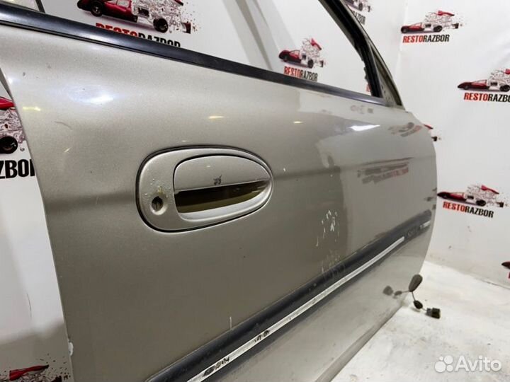 Дверь боковая передняя правая Kia Spectra седан