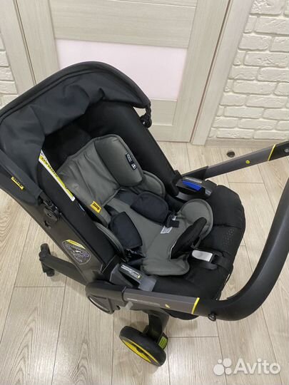 Коляска-автокресло Doona plus + isofix +аксессуары