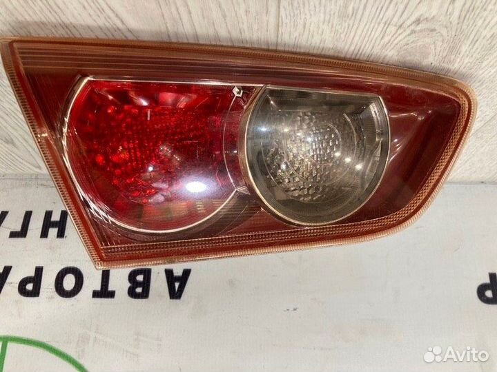 Фонарь в крышку багажника задний Mitsubishi Lancer