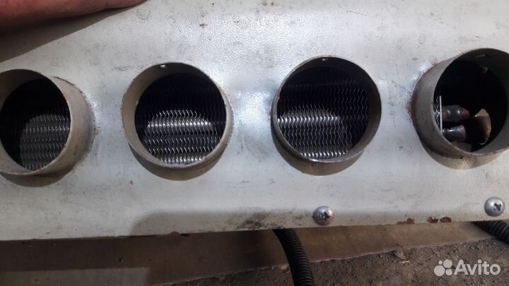 Дополнительний радиатор отопителя