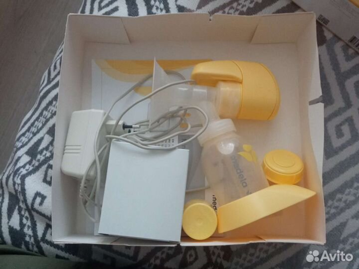 Молокоотсос medela электрический