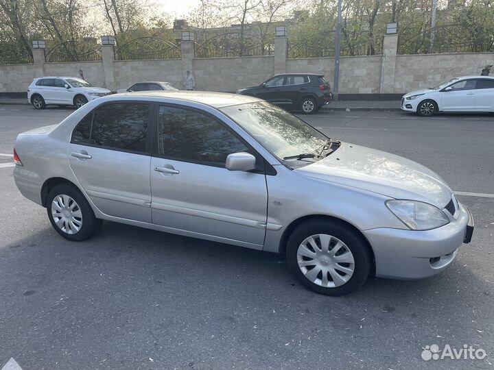 Mitsubishi Lancer 1.6 МТ, 2006, 205 000 км