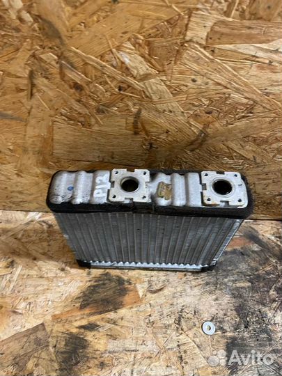 Радиатор печки Ниссан Примера P11