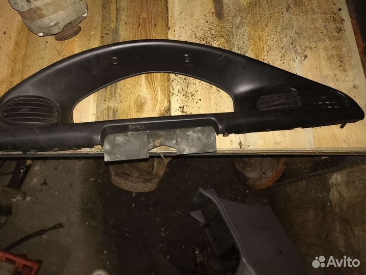 Панель салона Kia Avella