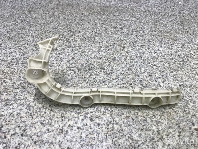 Кронштейн бампера передний левый Mitsubishi