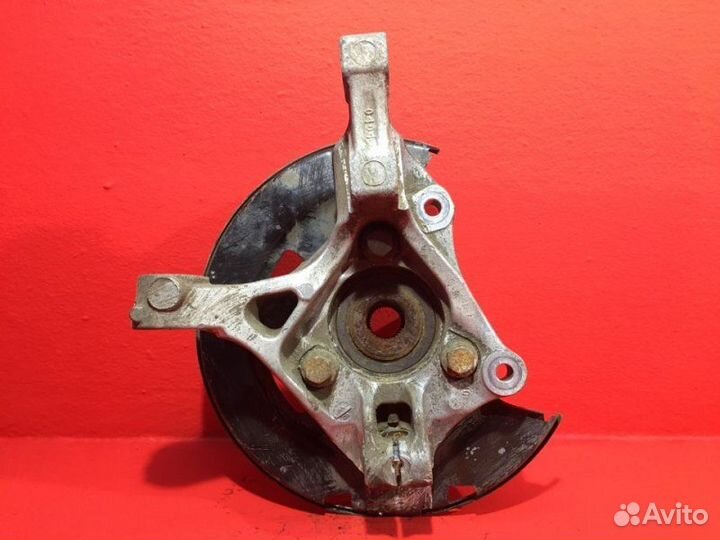 Кулак передний левый Opel Astra J A16XER 1.6