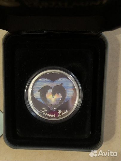 Серебряныая монета новая