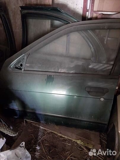 Двери на нисан альмера