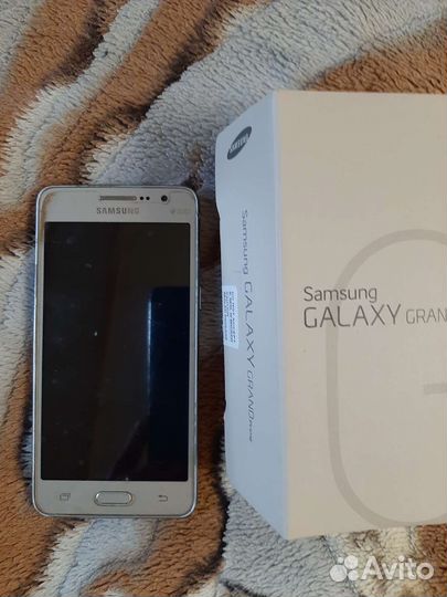 Телефон Samsung Galaxy Grand Prime