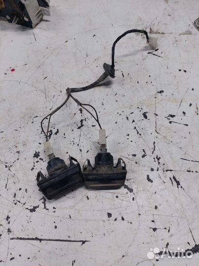 Фонарь подсветки номерного знака Mazda 323 BF