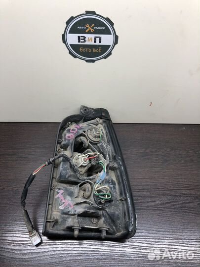 Задний фонарь левый Toyota Corolla 100 универсал