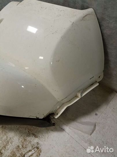 Бампер задний Ниссан жук