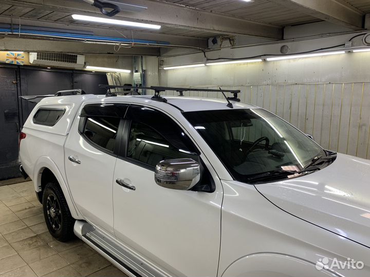 Поперечины на крышу Mitsubishi L200