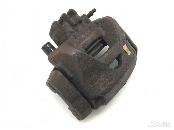 Суппорт тормозной передний левый Peugeot Partner