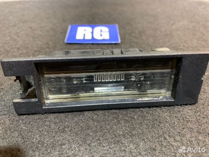 Фонарь подсветки номера Opel Insignia лифтбек