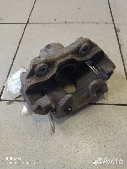 Суппорт тормозной передний левый Volkswagen Polo