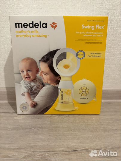 Молокоотсос medela электрический