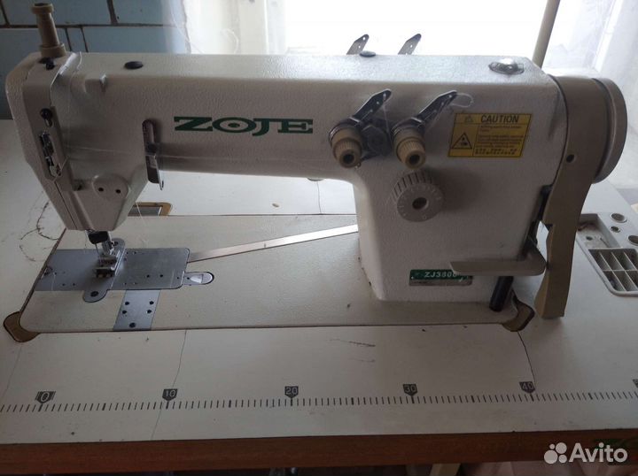 Двухигольная машина цепного стежкаzoje