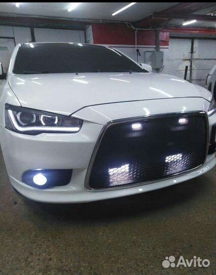 Решетка радиатора mitsubishi lancer 10 рестайлинг