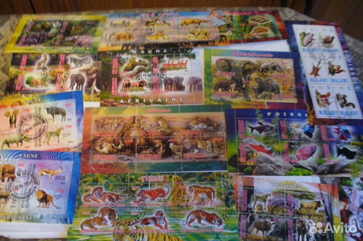 Коллекция из 100 листов марок фауна флора животные