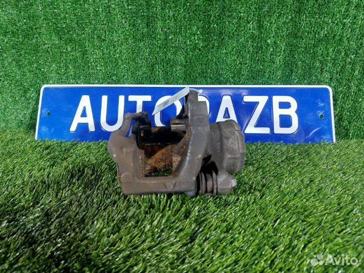 Суппорт тормозной передний левый Peugeot 207